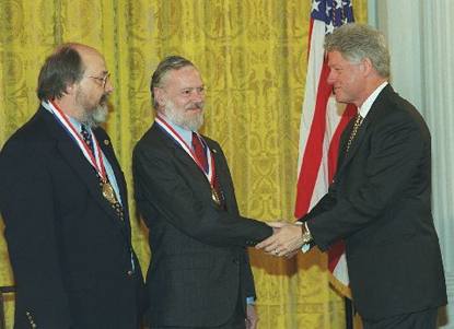 [ Ken Thompson and Dennis Ritchie at the 
White House with President Clinton ]